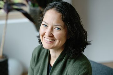 A photo of podcast guest, Katie Brennan of Thrive Ninety, who discusses her experience with long COVID